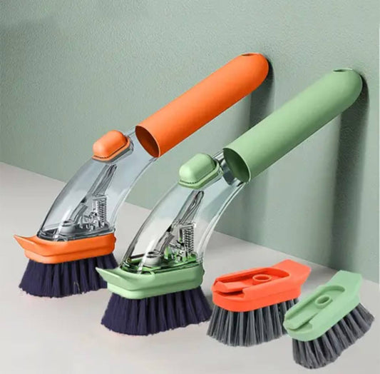 Brosse à vaisselle avec réservoir de savon intégré